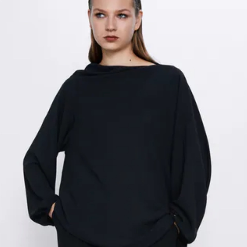 Unique neckline, asymmetrical blouse
